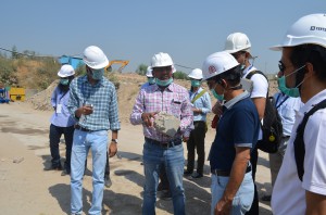 Technical Adviser explaining how C&D waste is recycled to make Building Materials